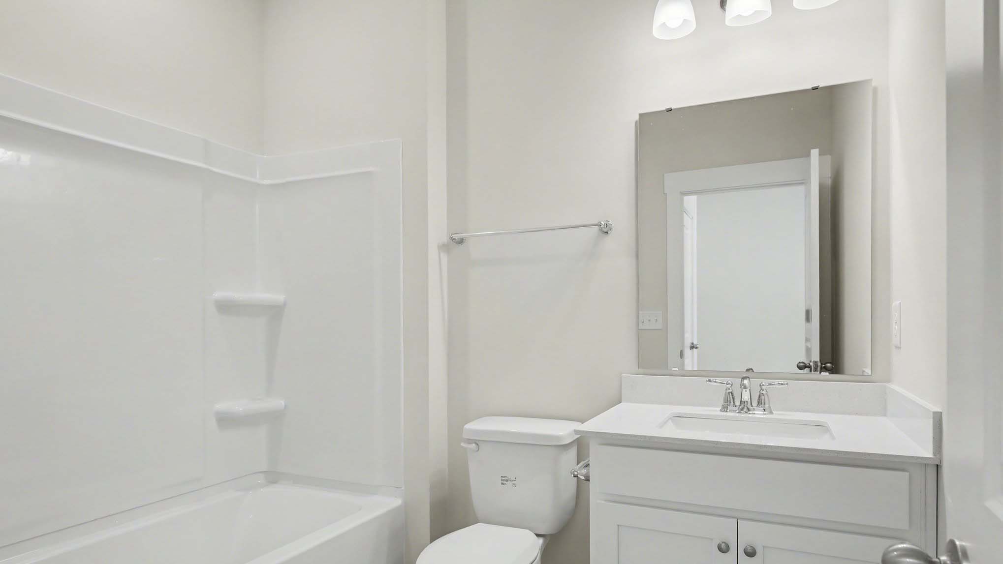 secondary bathroom with tub shower