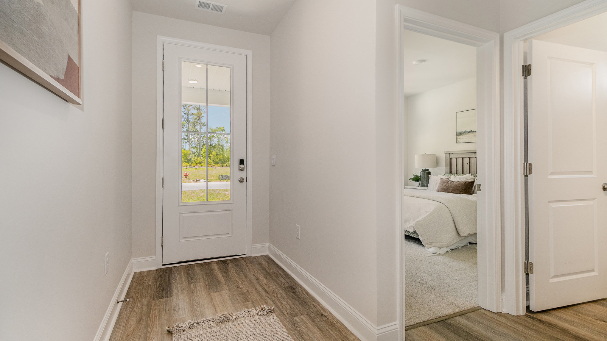 entryway with white door