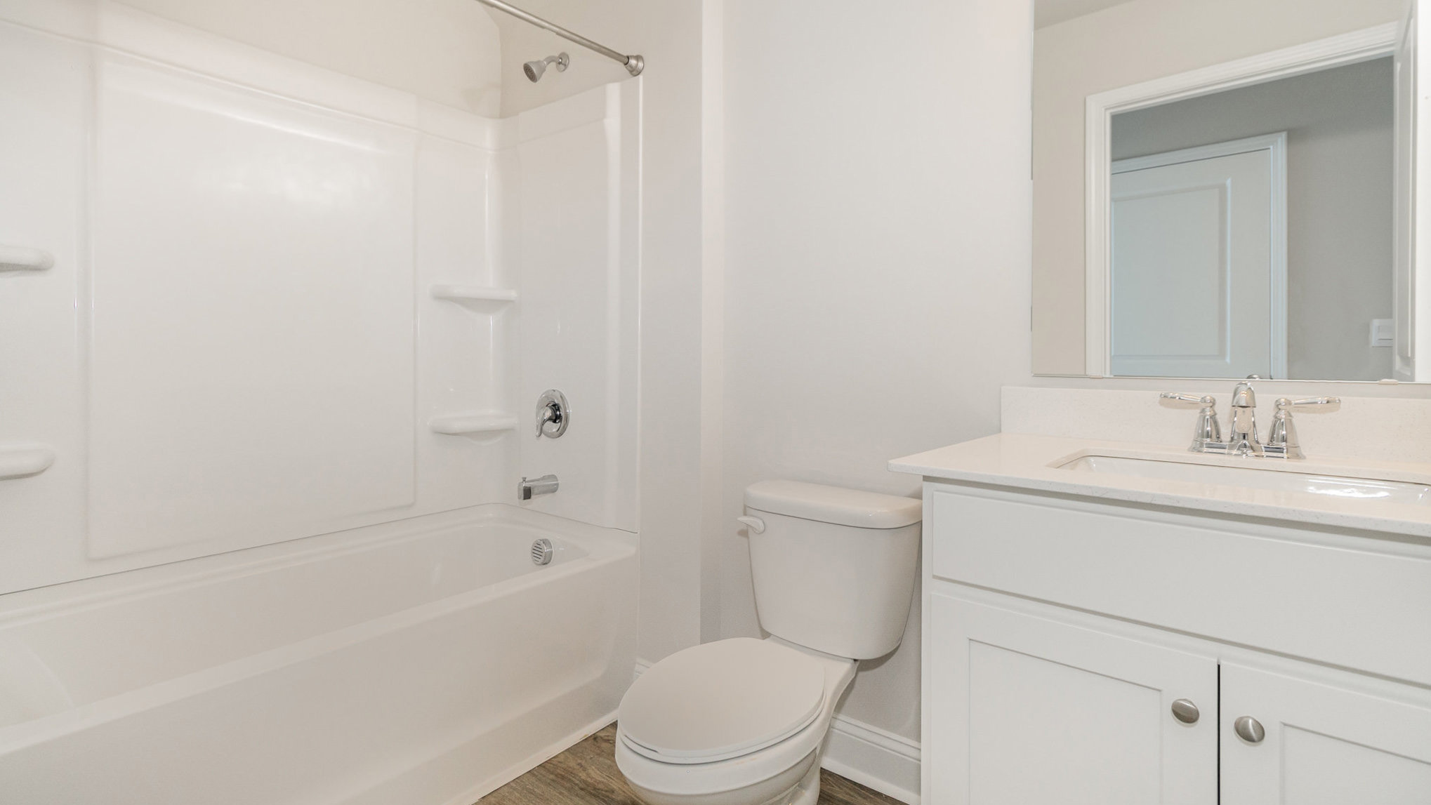 bathroom with quartz counters