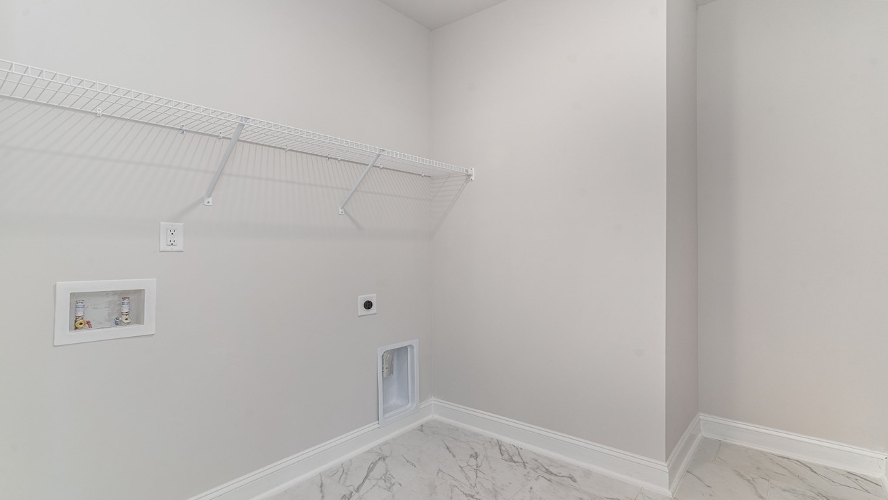 laundry room with wire shelving