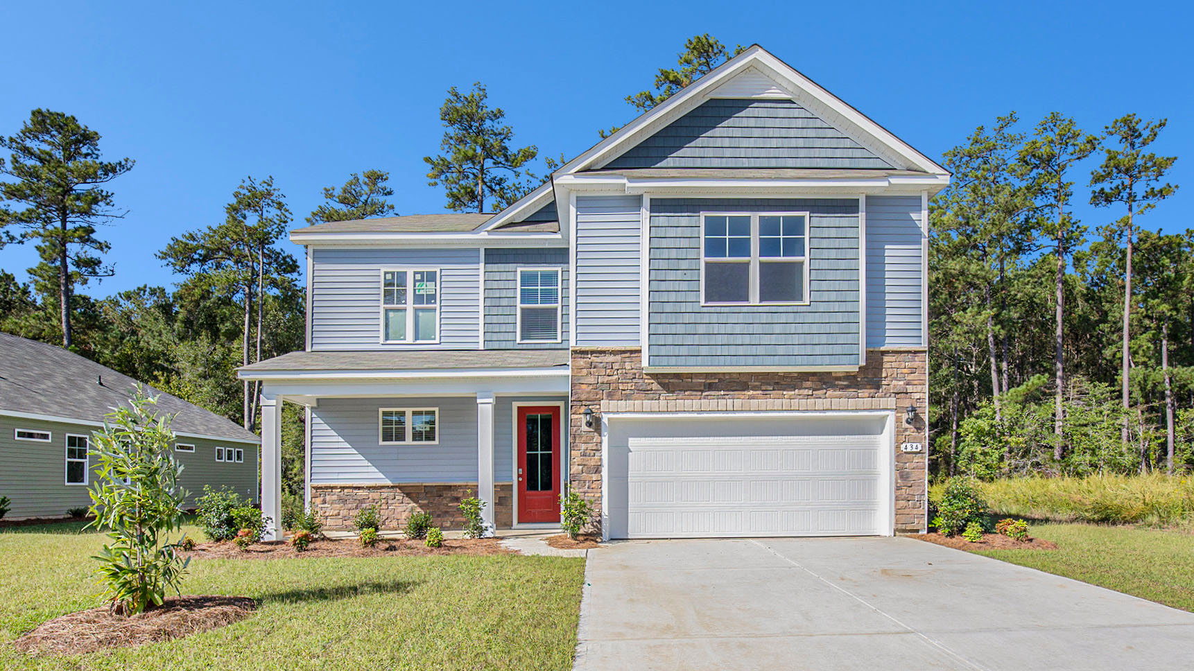 twos tory home with vinyl siding