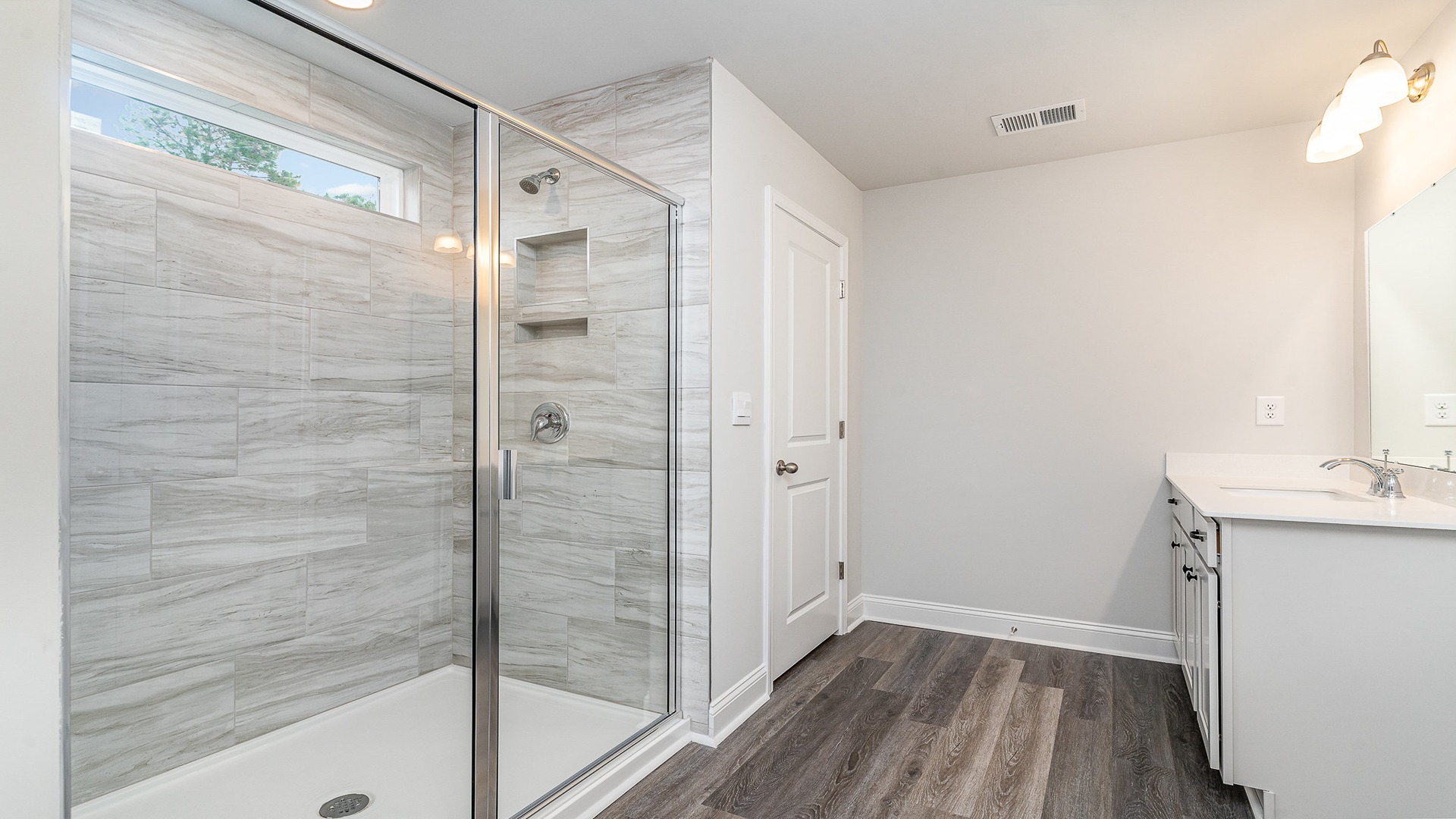 bathroom with quartz counters