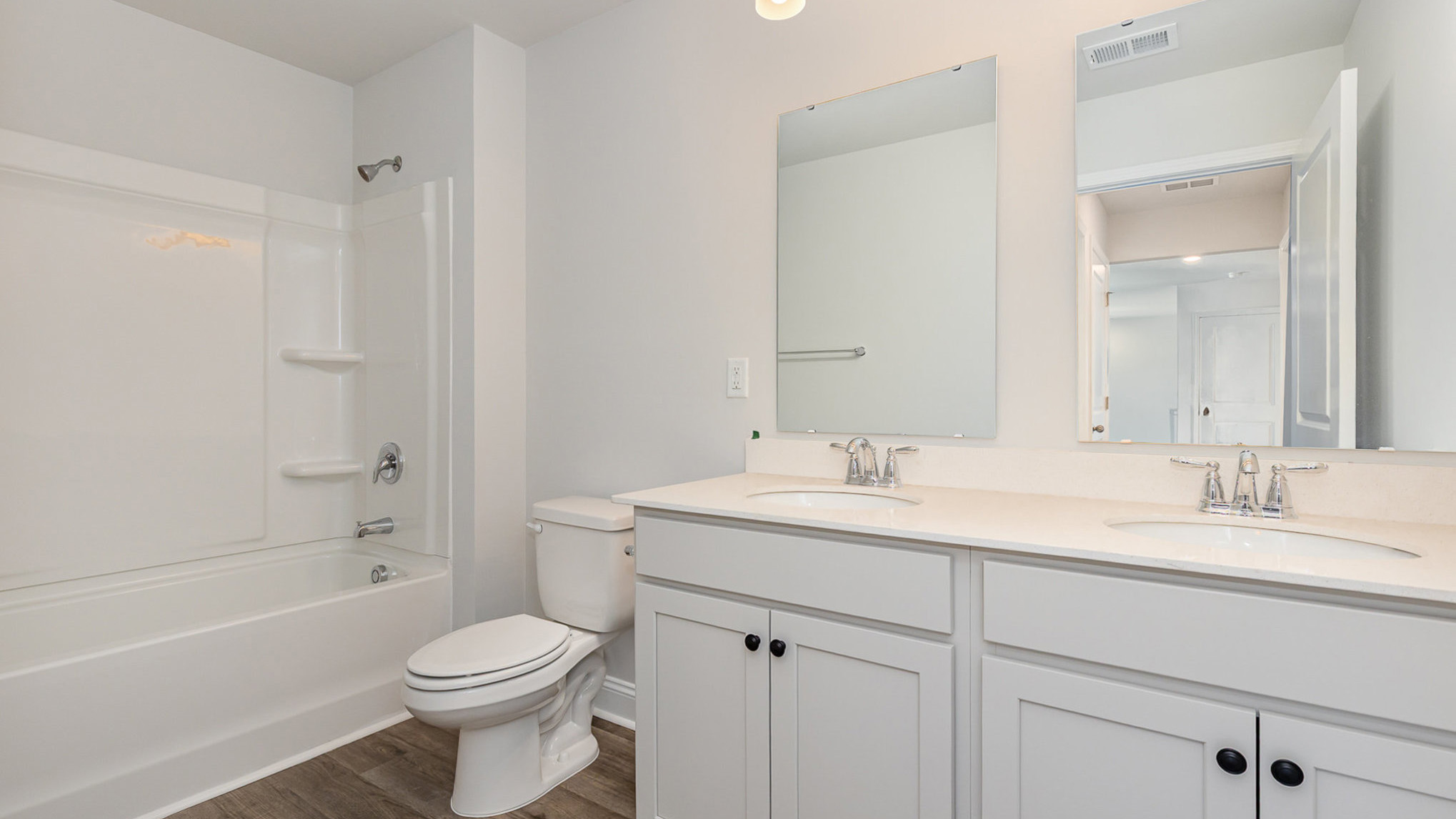 bathroom with quartz counters