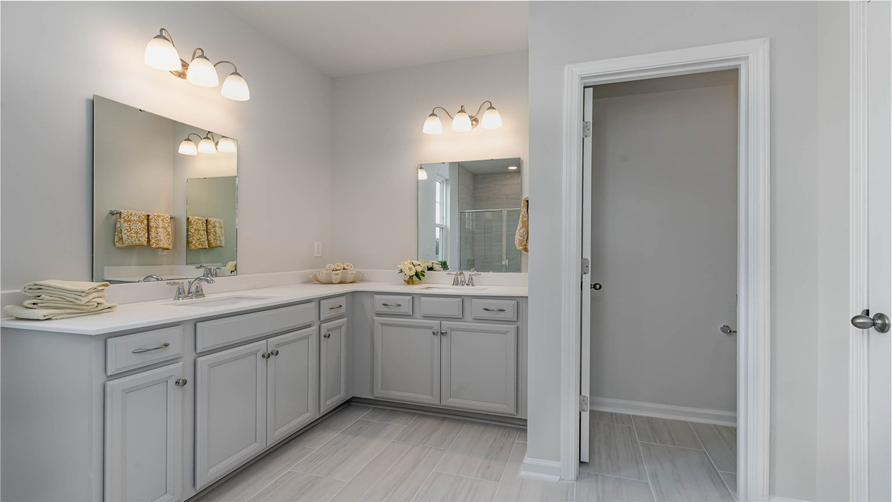 bathroom with quartz counters