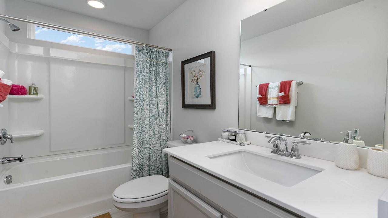 bathroom with quartz counters