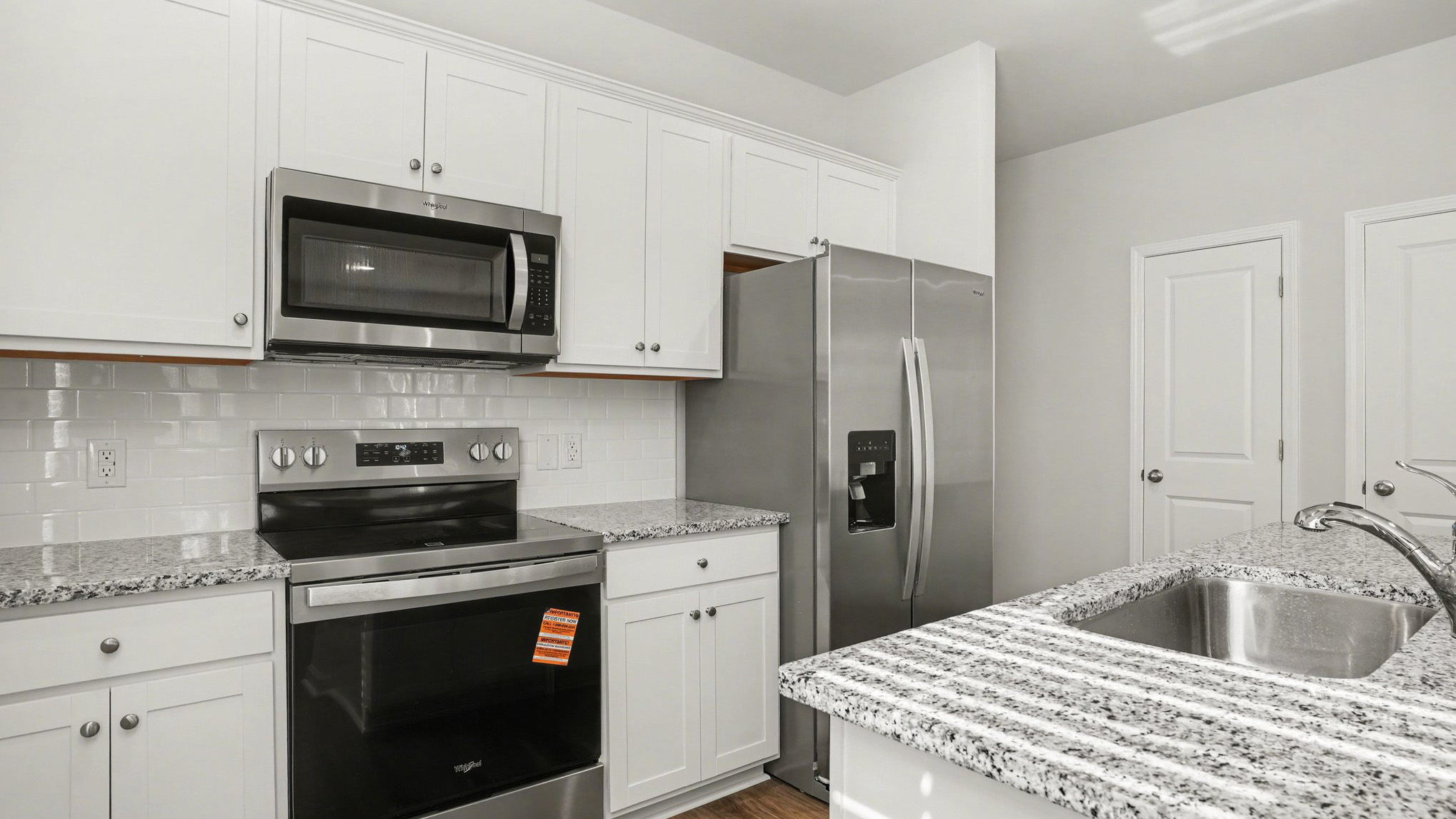 kitchen with white cabinets