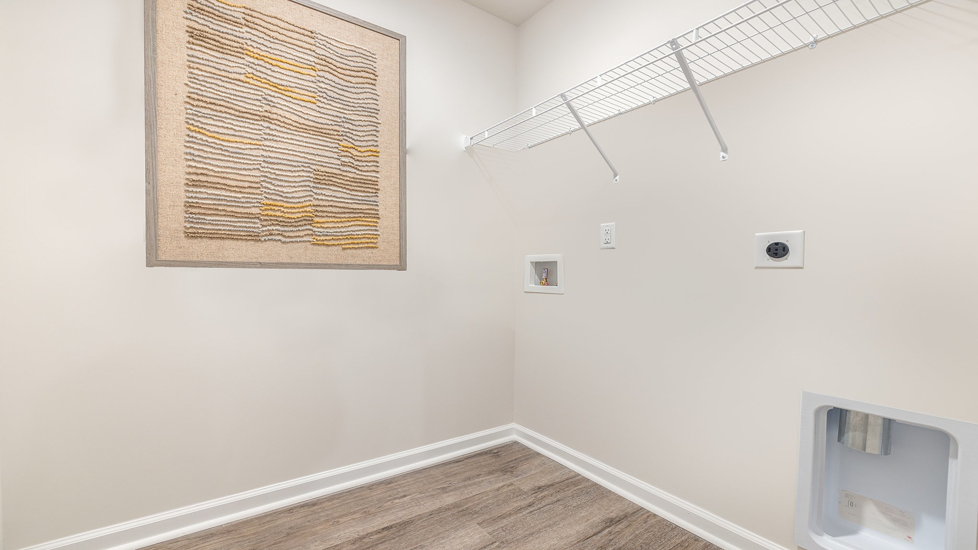laundry room with wire shelving