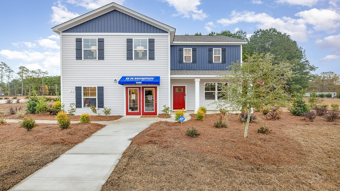 Two story home with vinyl siding