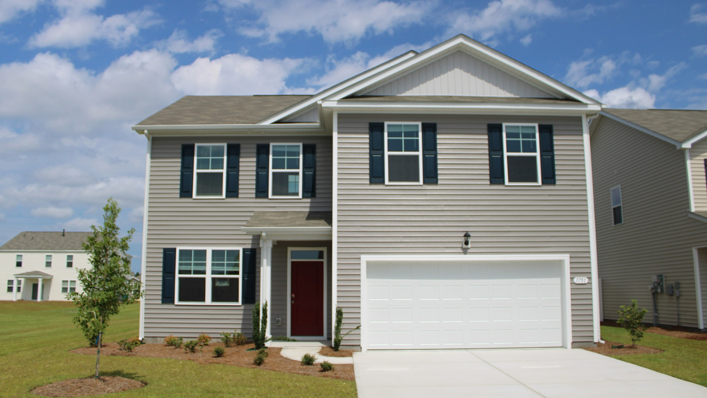 Two story home with vinyl siding