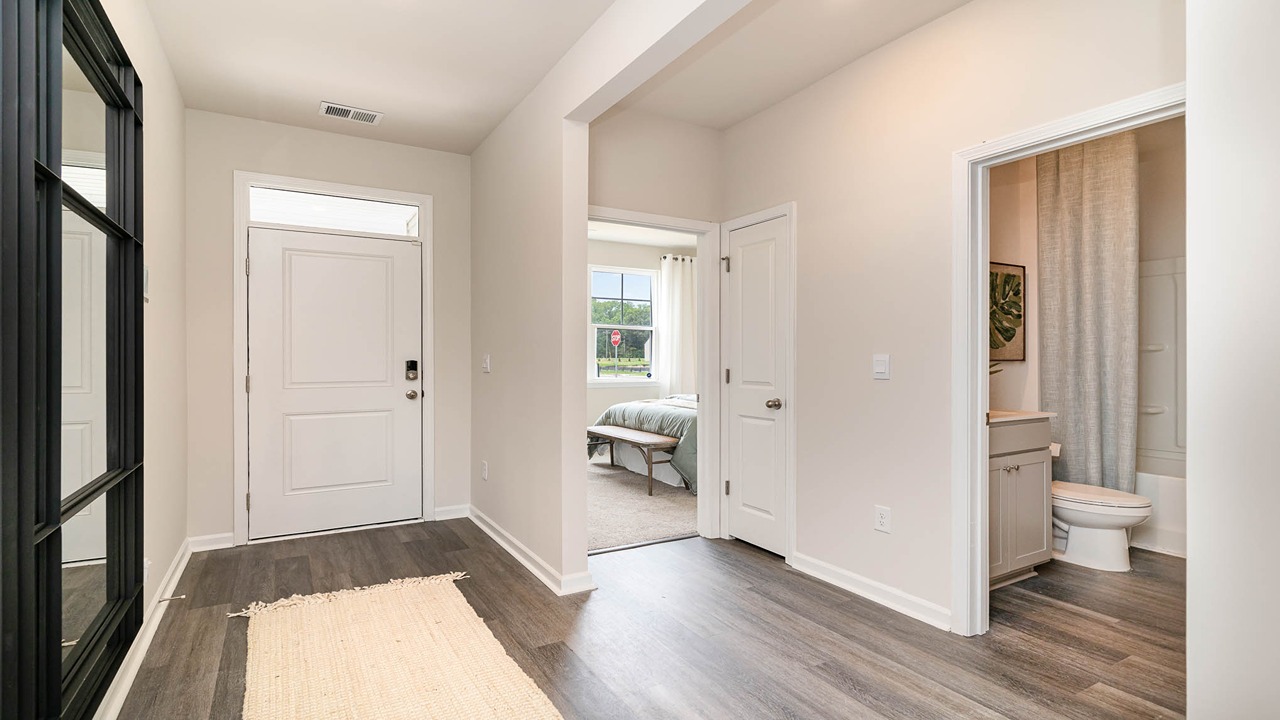 entryway with white door