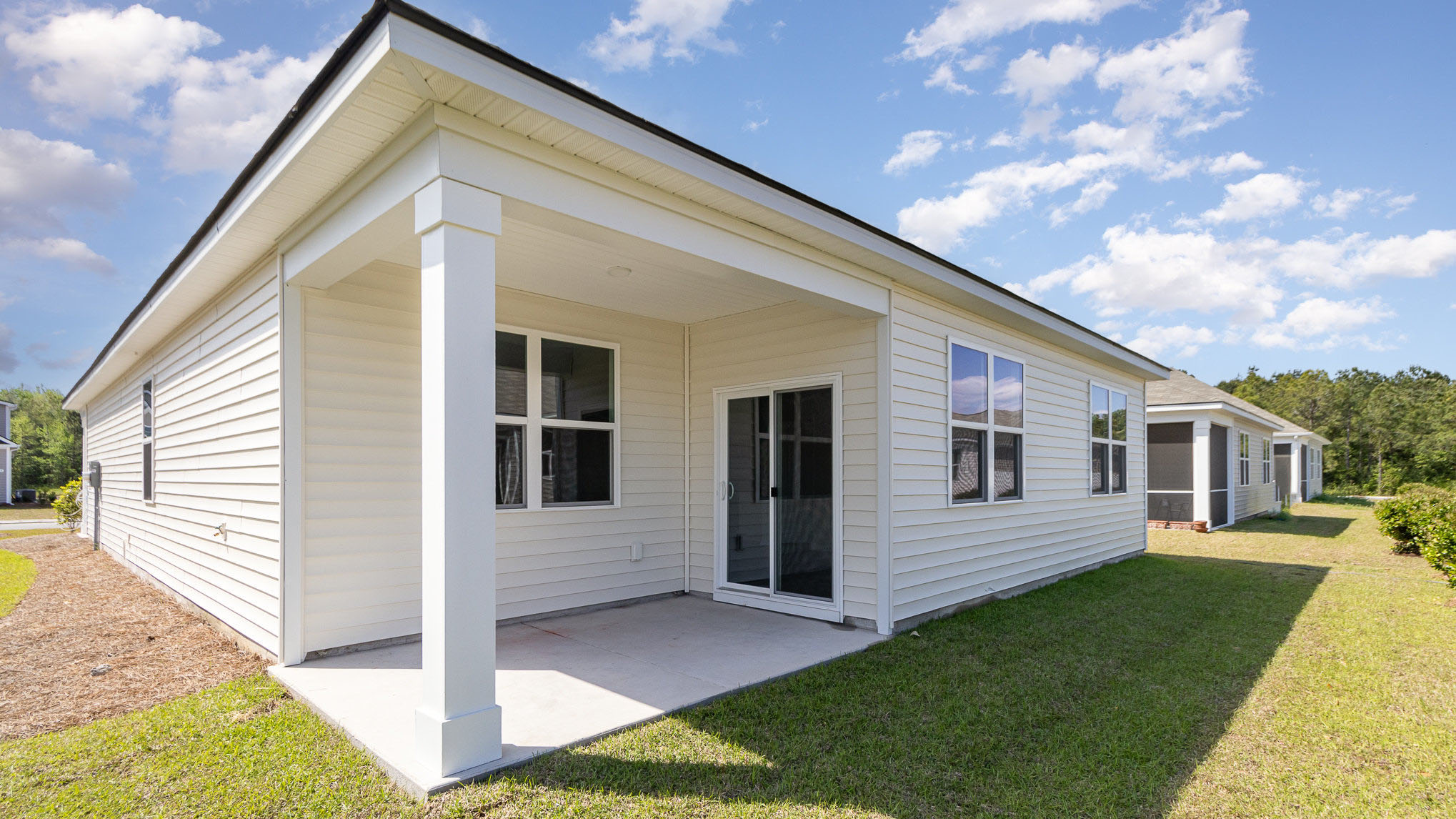 Single-story home exterior backside