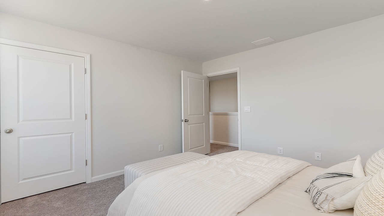 bedroom with closet door