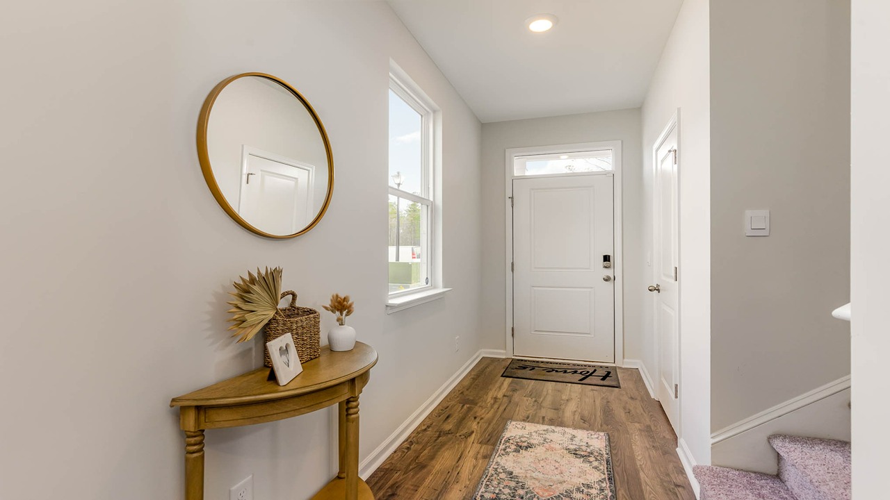 entryway with white door
