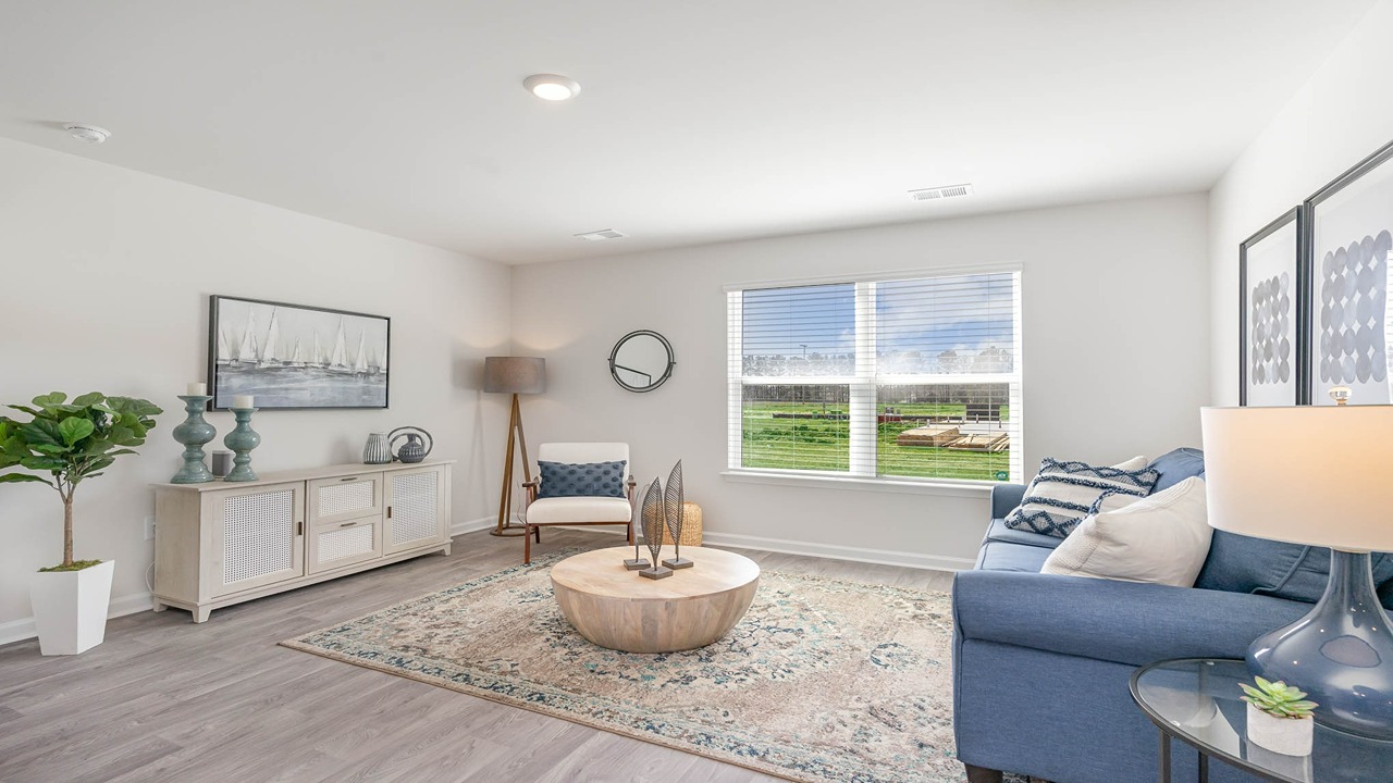 living room with ample lighting