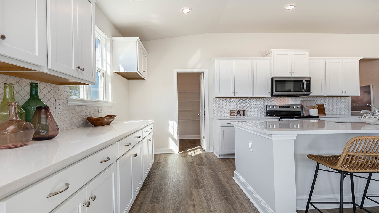 kitchen with white cabinets