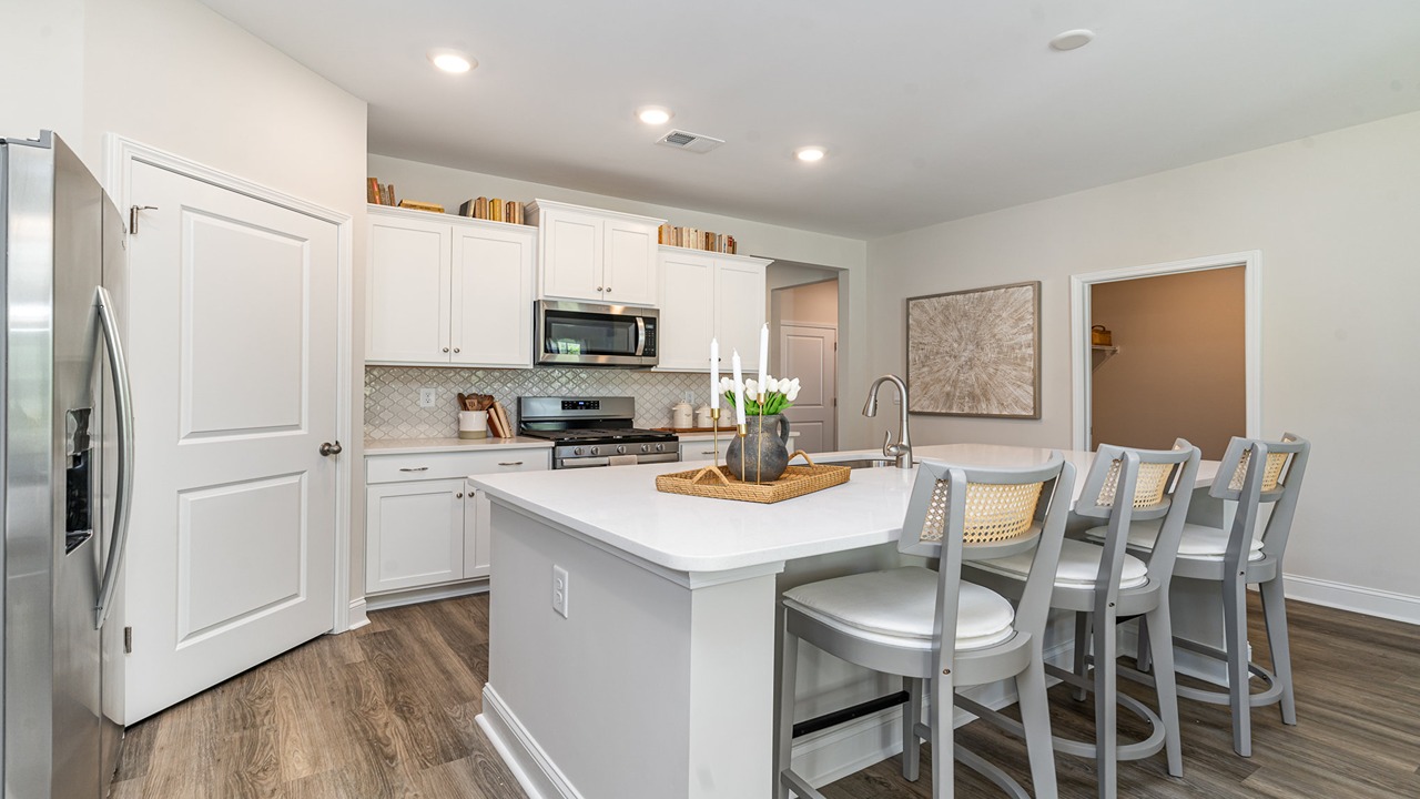 kitchen with white cabinets