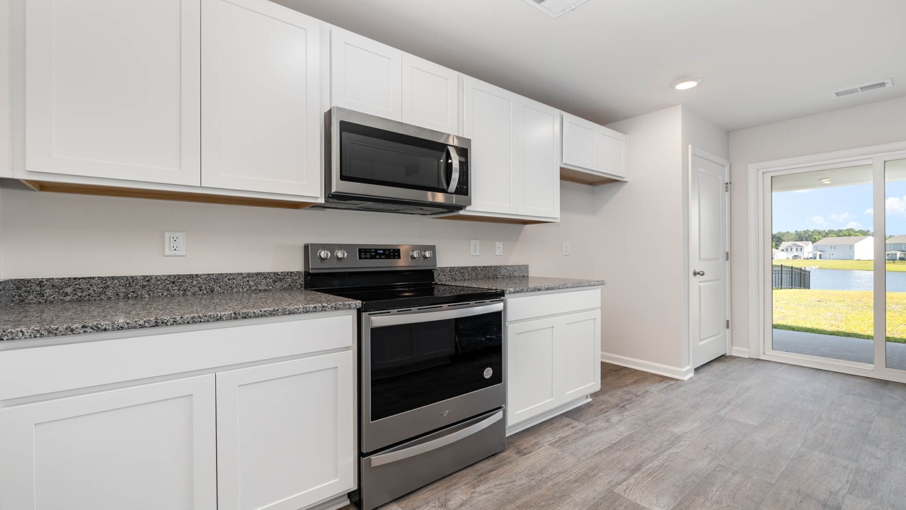 kitchen with white cabinets