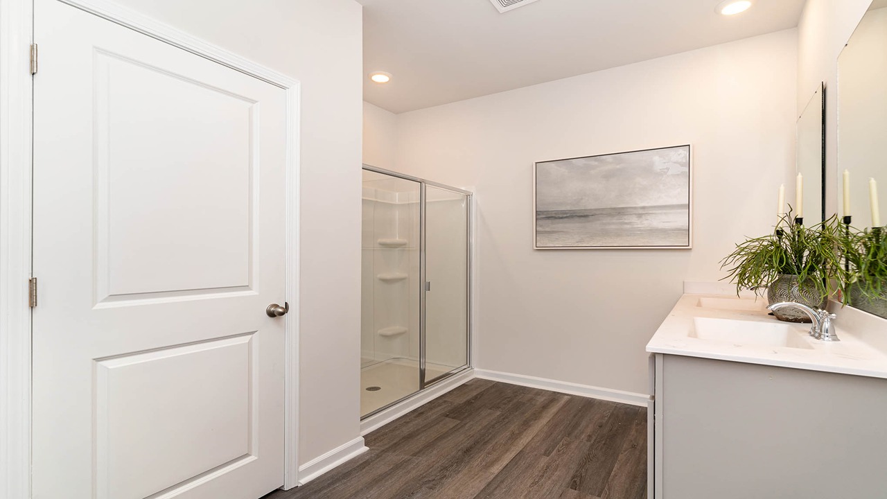 primary bathroom with walk in shower