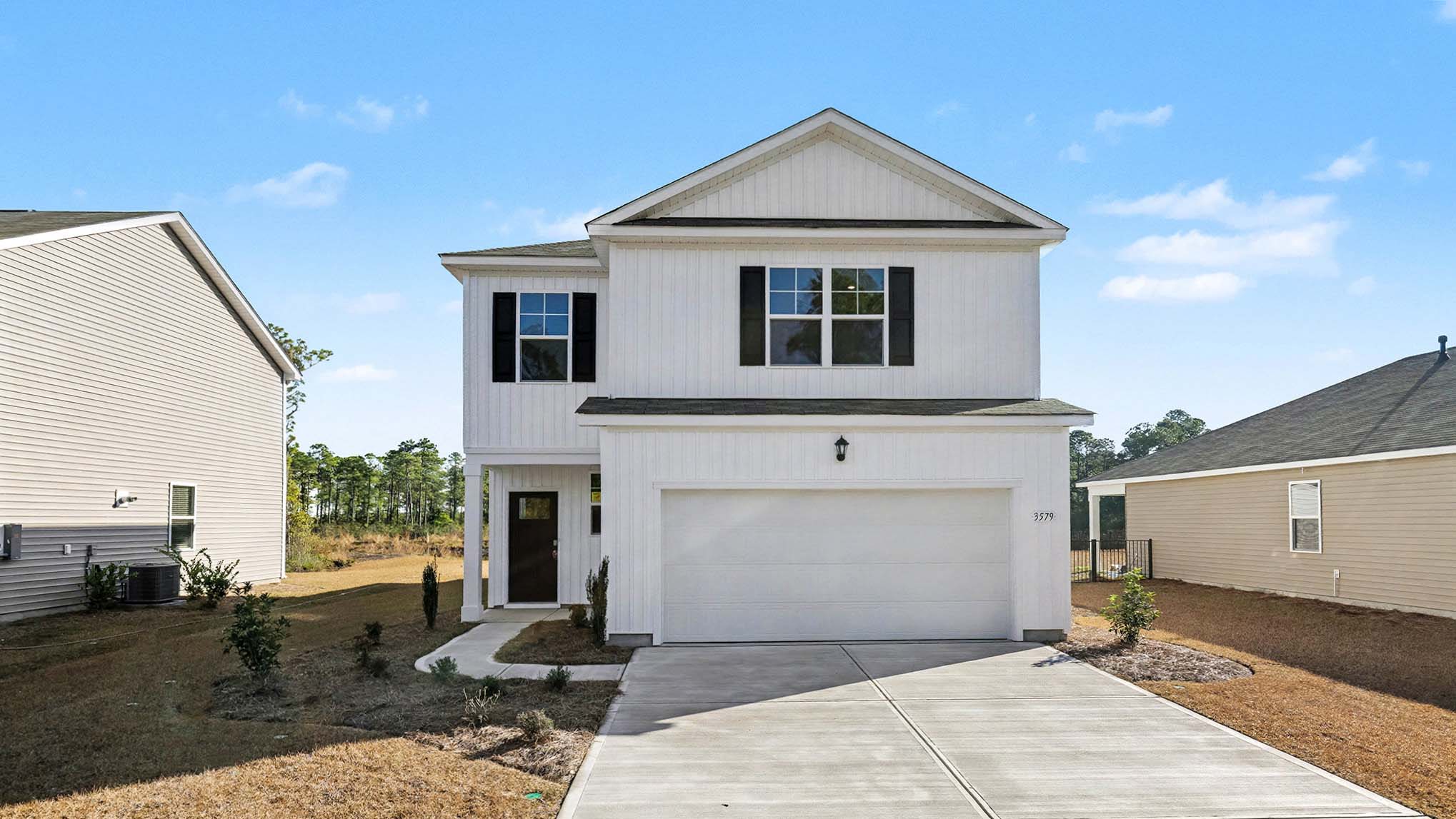 two story home with vinyl siding
