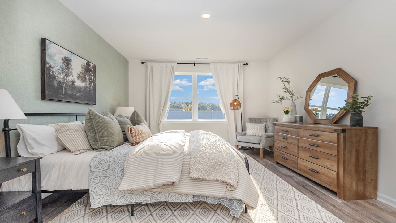 primary bedroom with lvp