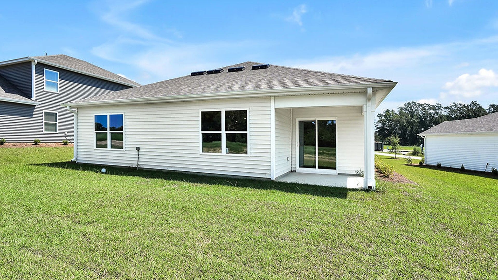 Enjoy the covered porch perfect for entertaining and enjoying the Carolina evenings