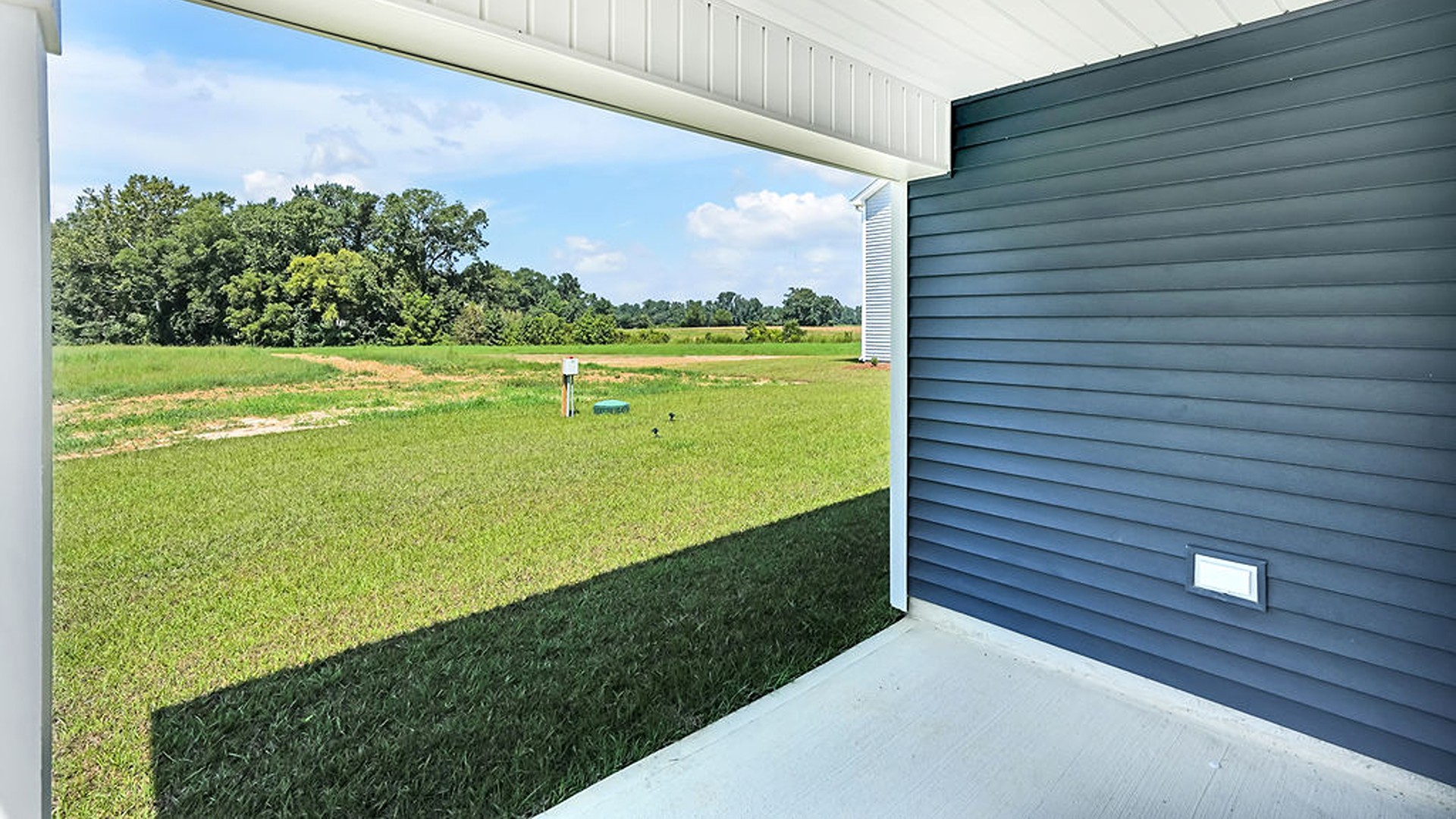Enjoy the covered porch perfect for entertaining and enjoying the Carolina evenings.