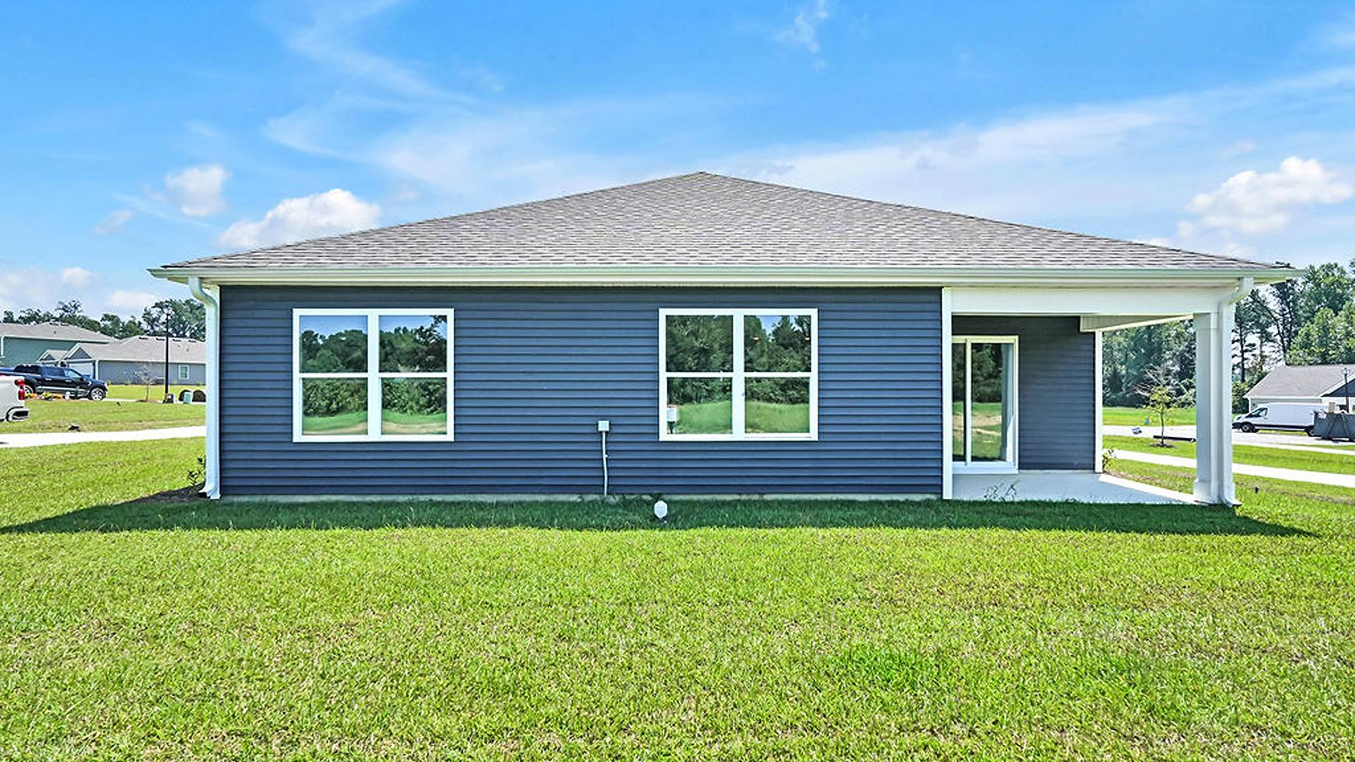 Enjoy the covered porch perfect for entertaining and enjoying the Carolina evenings.