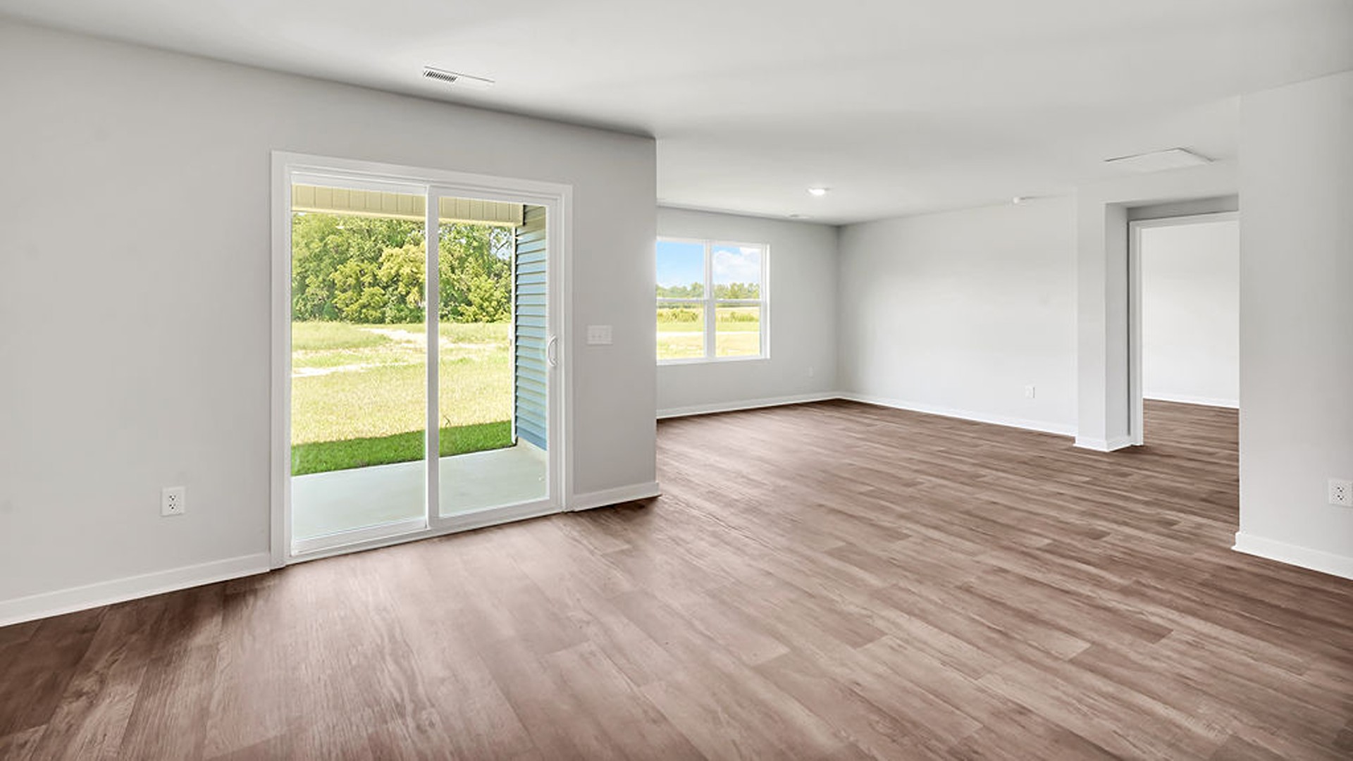 The living area is an open concept, where your kitchen, living, and dining areas blend