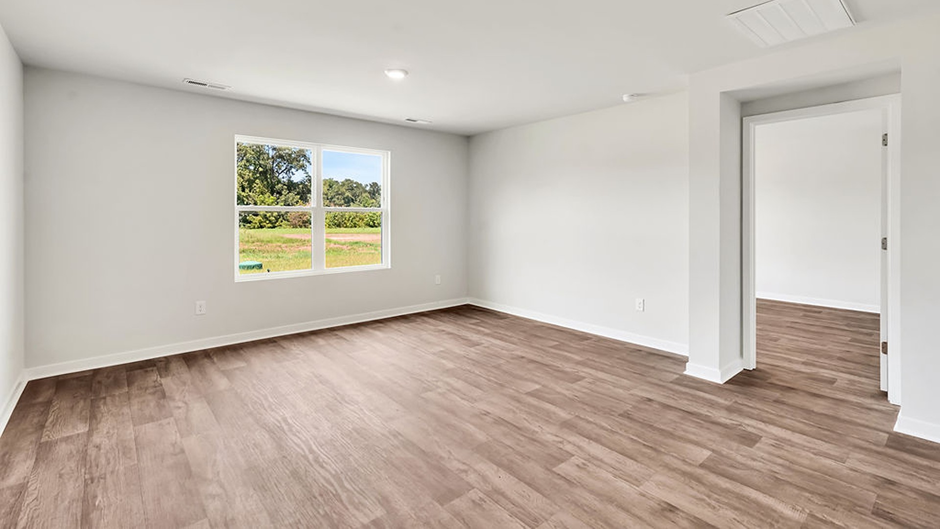 The living area is an open concept, where your kitchen, living, and dining areas blend
