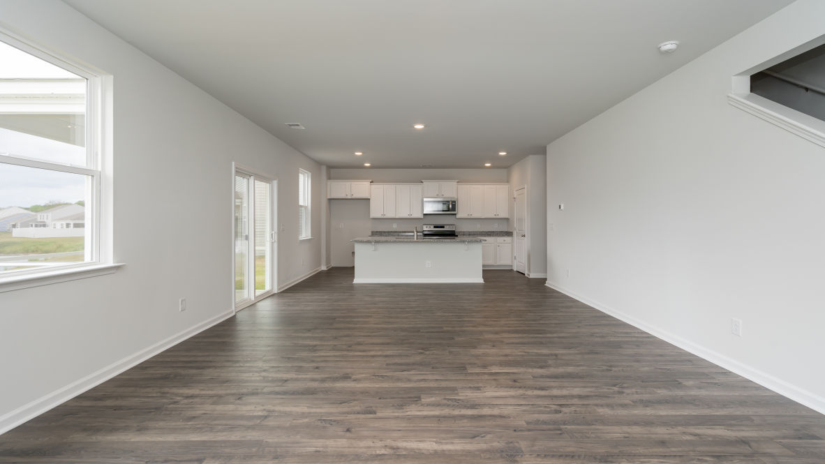 The living area is an open concept, where your kitchen, living, and dining areas blend seamlessly into a space perfect for everyday living and entertaining.