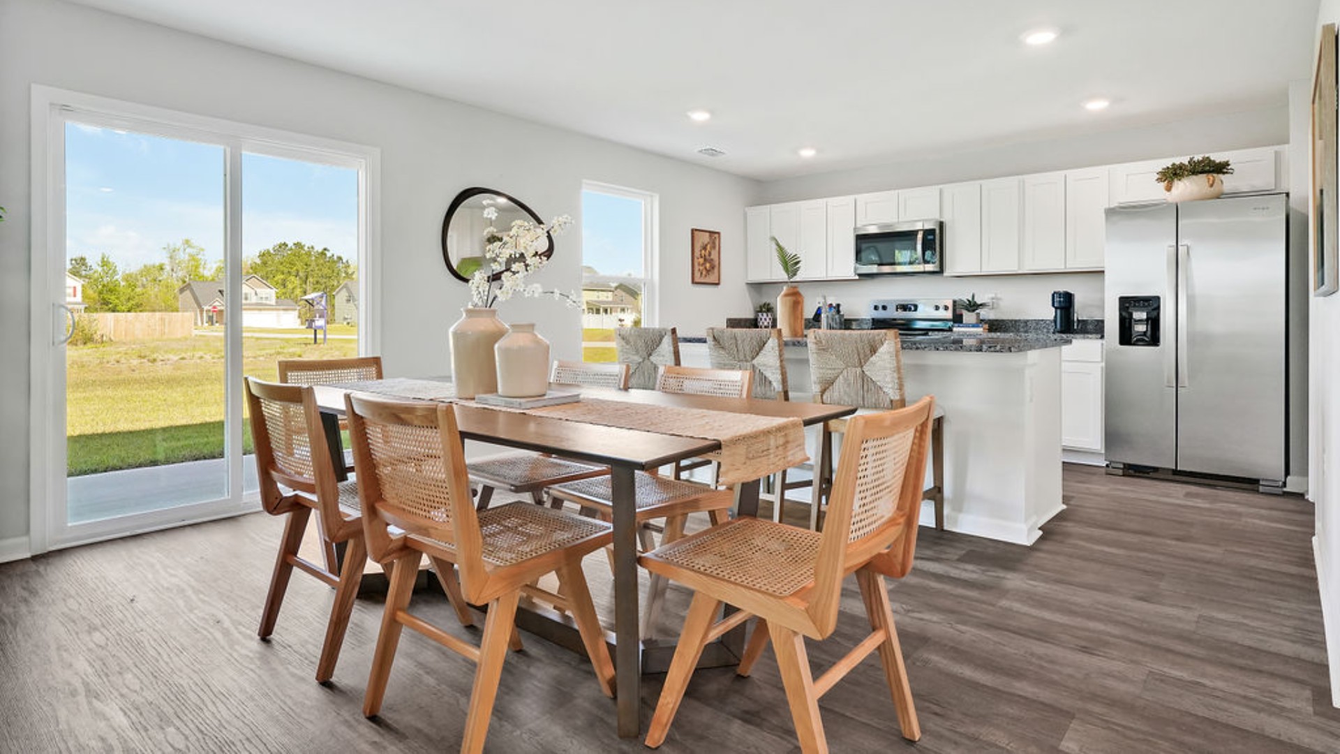 The living area is an open concept, where your kitchen, living, and dining areas blend