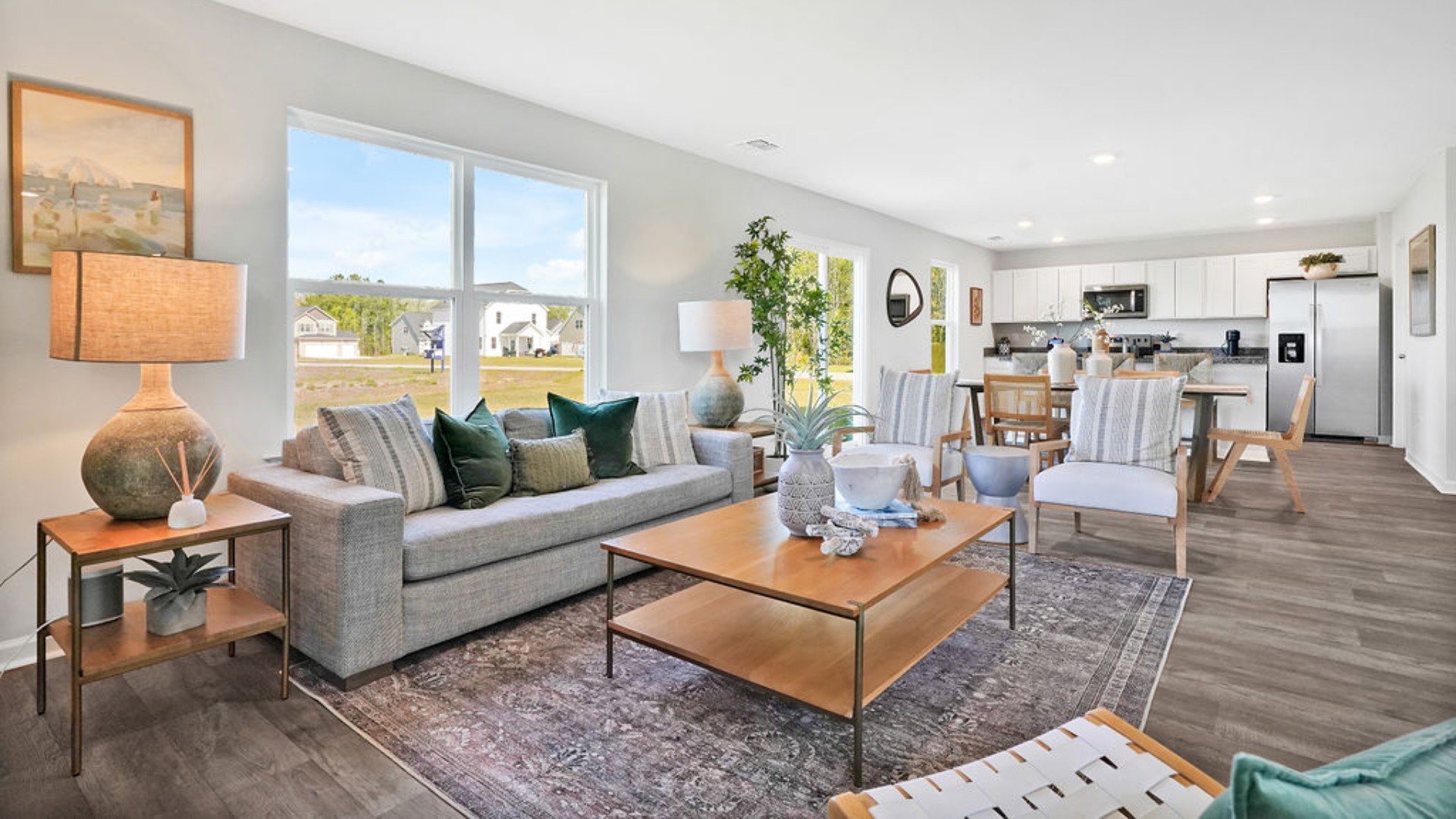 The living area is an open concept, where your kitchen, living, and dining areas blend