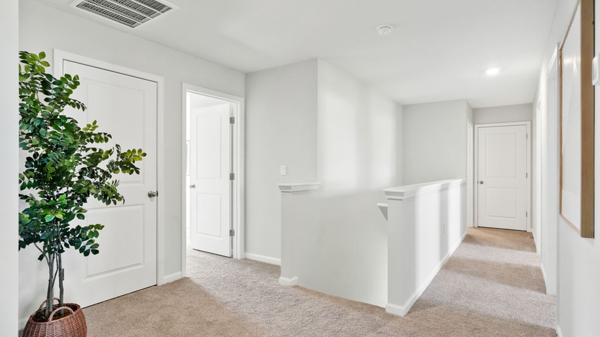 The rest of the second floor includes three additional bedrooms and a convenient laundry room