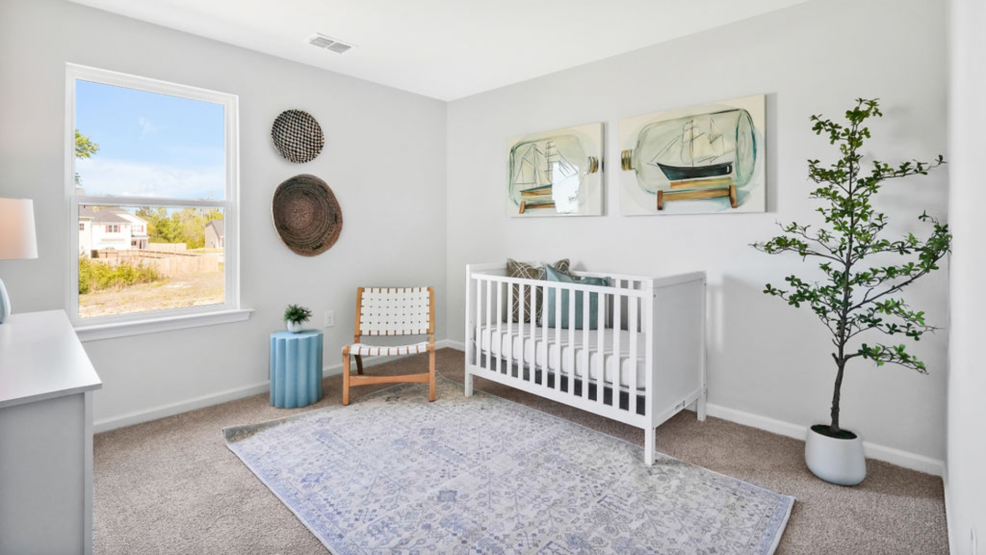 second floor includes three additional bedrooms and a convenient laundry room.