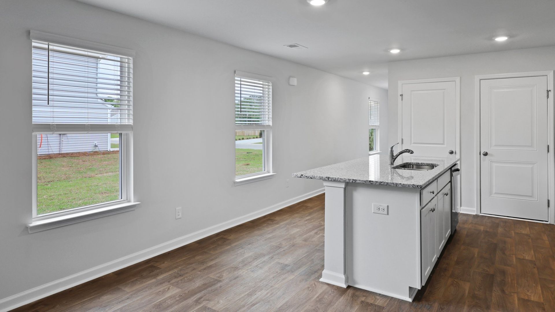 This appealing one-story layout optimizes living space with an open concept kitchen situated in between the living room and dining room and all bedrooms upstairs. The living room overlooks a covered patio perfect for relaxing and entertaining outdoors.