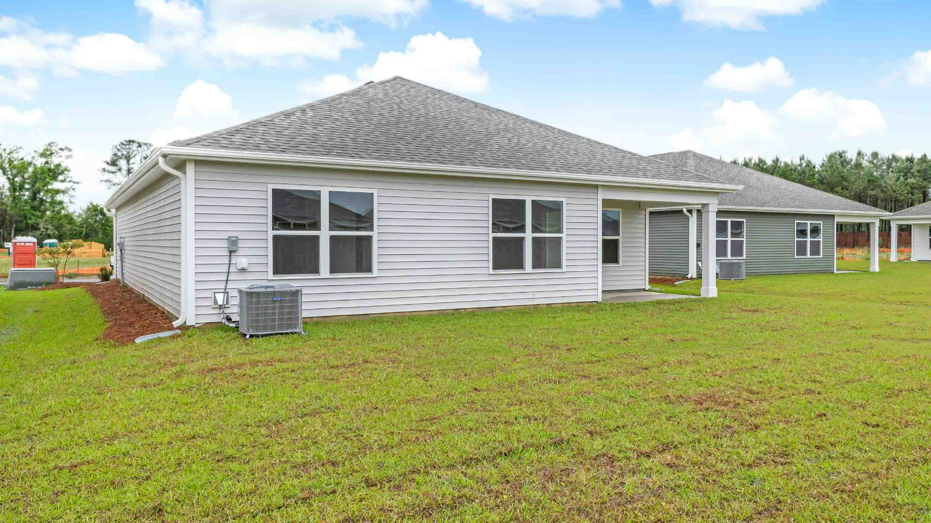 Enjoy the covered porch perfect for entertaining and enjoying the Carolina evenings.