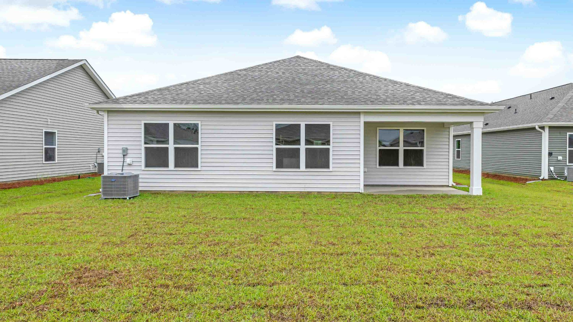 Enjoy the covered porch perfect for entertaining and enjoying the Carolina evenings.