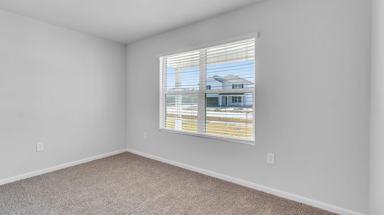 Entering the home, you’ll find access to two bedrooms that share a full bathroom.