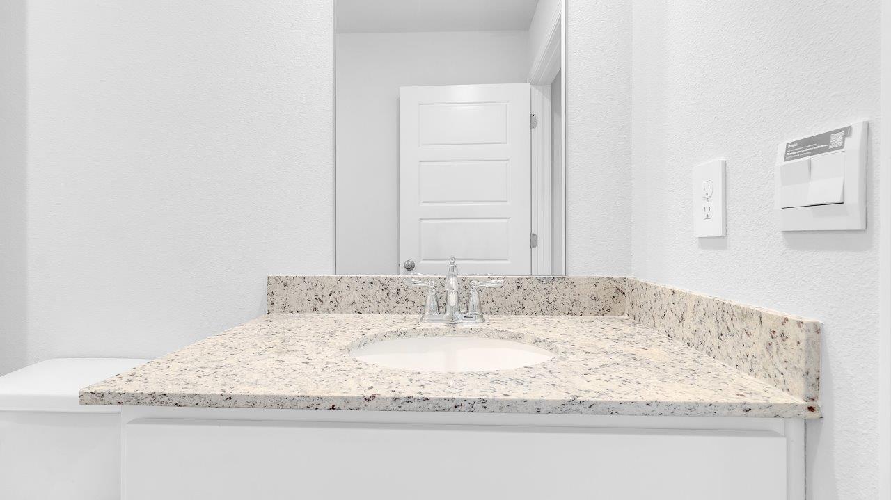 Entering the home, you’ll find access to two bedrooms that share a full bathroom.