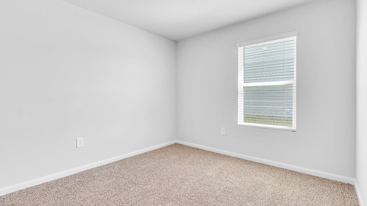 Entering the home, you’ll find access to two bedrooms that share a full bathroom.