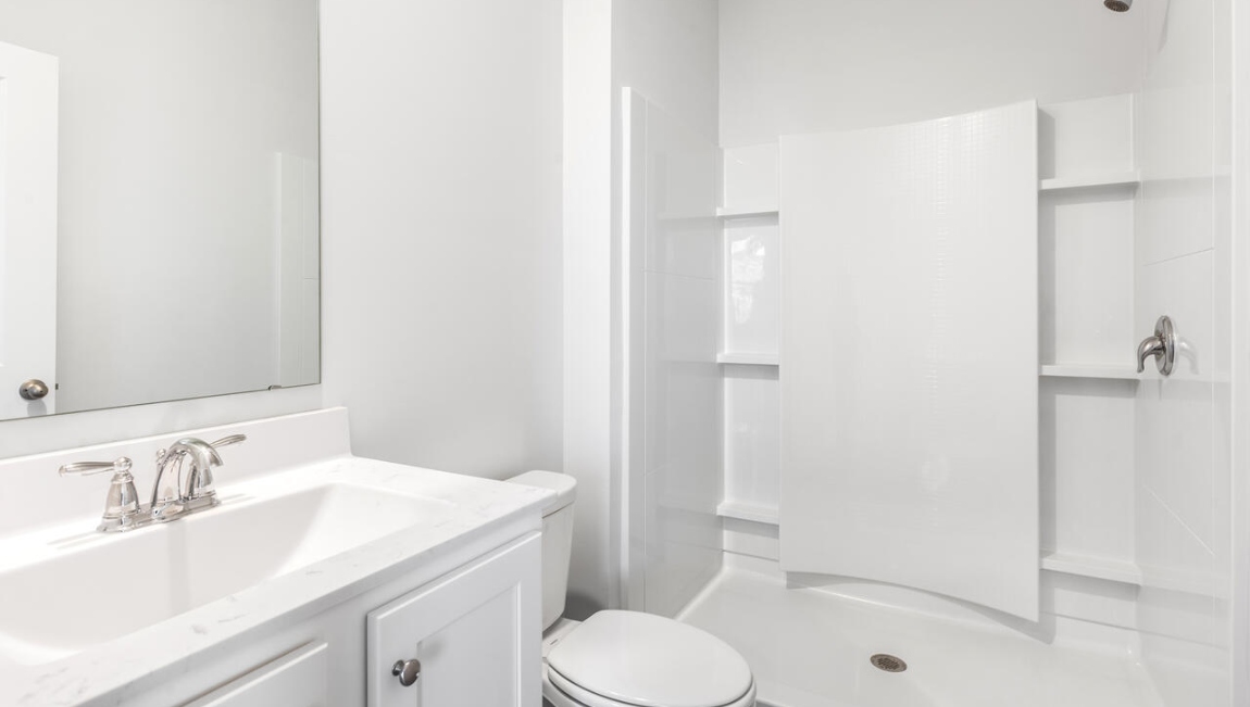 The 2nd floor offers an primary oasis with walk-in shower, dual vanity and massive walk-in closet offering everything you could have hoped for in your new home
