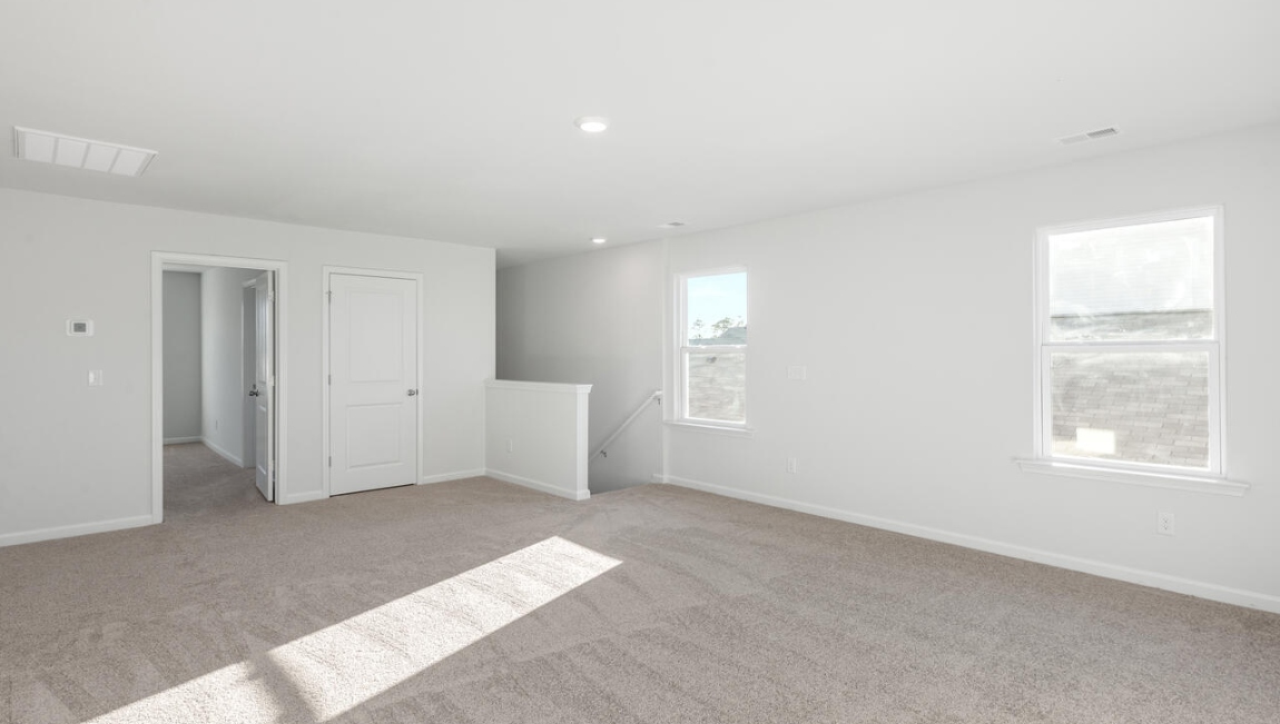 The 2nd floor offers an primary oasis with walk-in shower, dual vanity and massive walk-in closet offering everything you could have hoped for in your new home