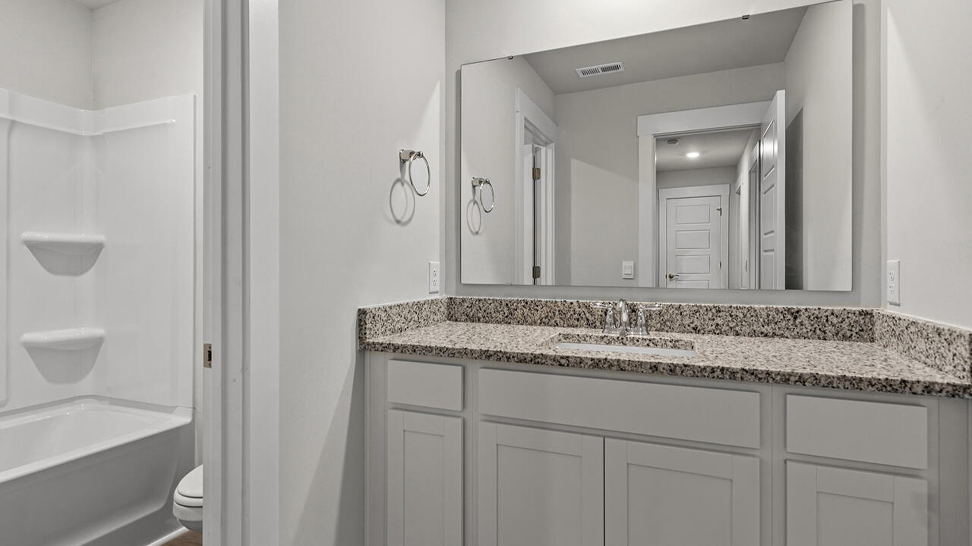 Upstairs, you will find three bedrooms,2 full bathrooms, bonus room and a loft. In every bedroom you’ll have carpeted floors and a closet in each room.