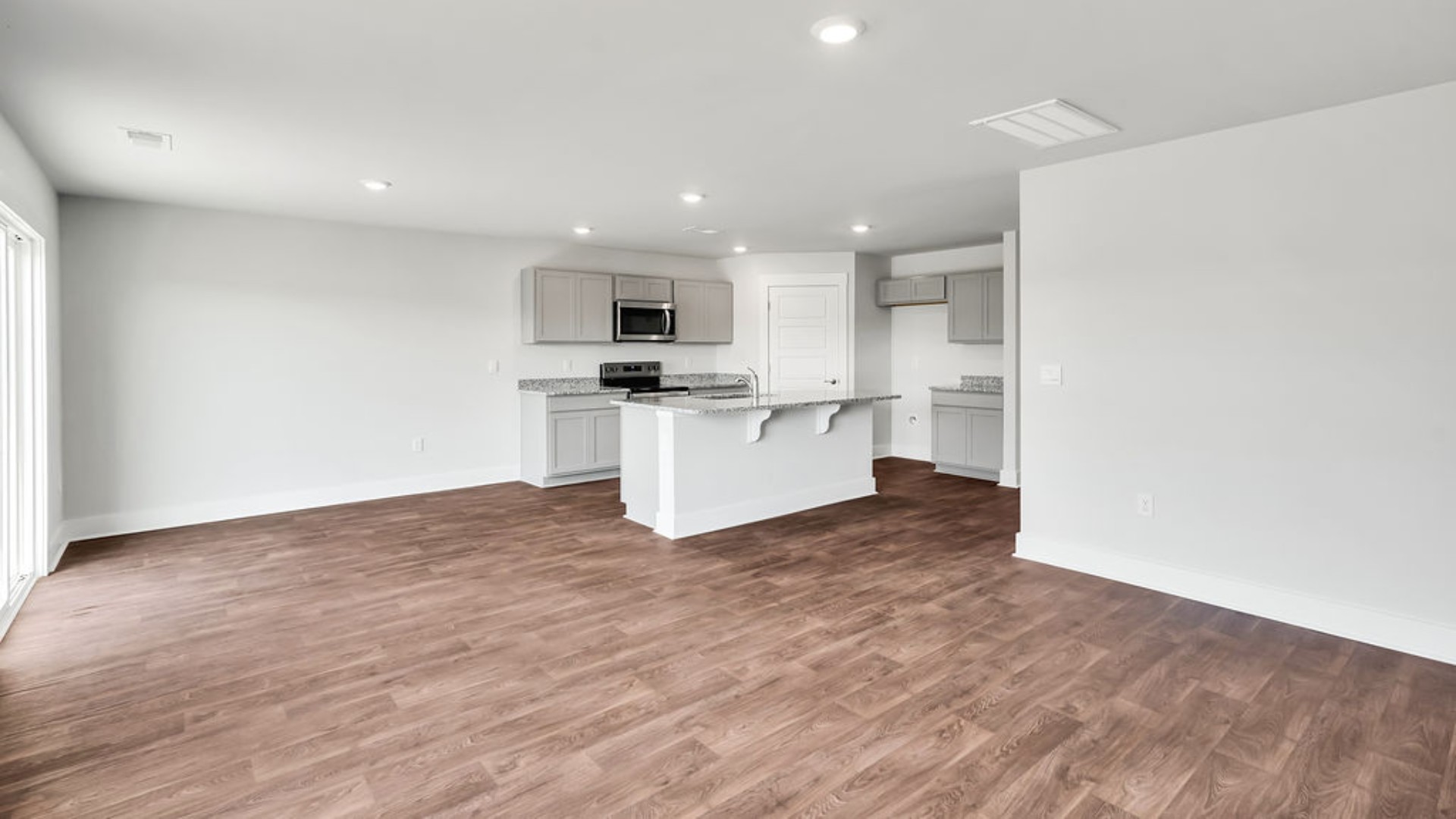 The living area is an open concept, where your kitchen, living, and dining areas blend seamlessly into a space perfect for everyday living and entertaining.