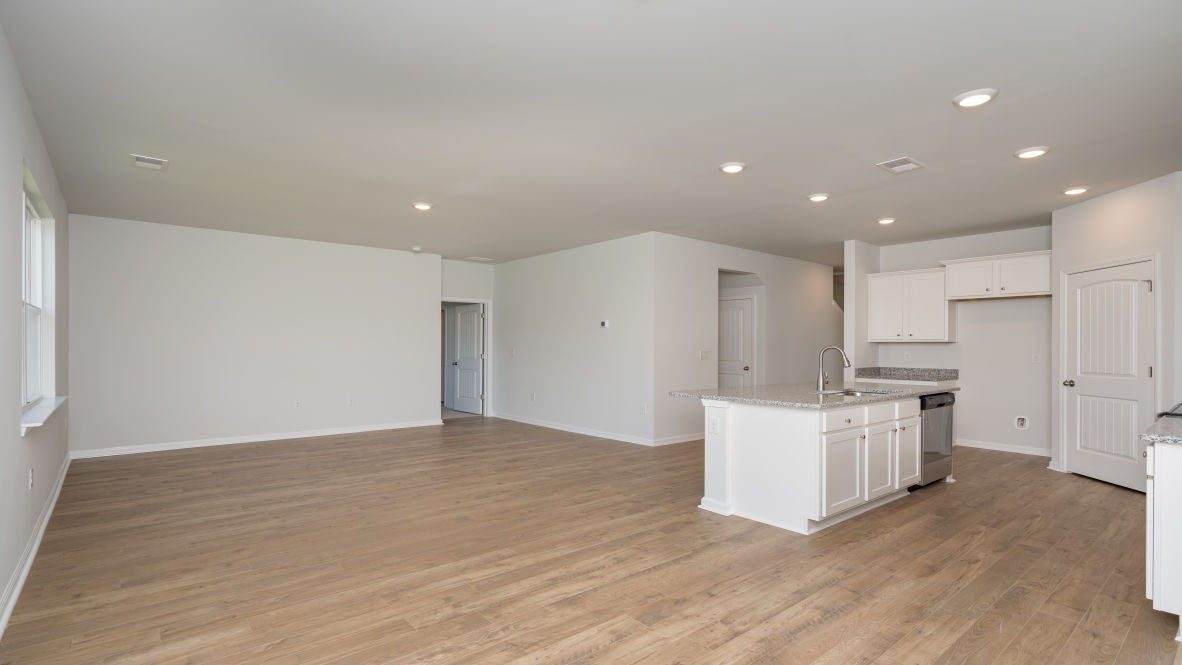 The living area is an open concept, where your kitchen, living, and dining areas blend seamlessly into a space perfect for everyday living and entertaining