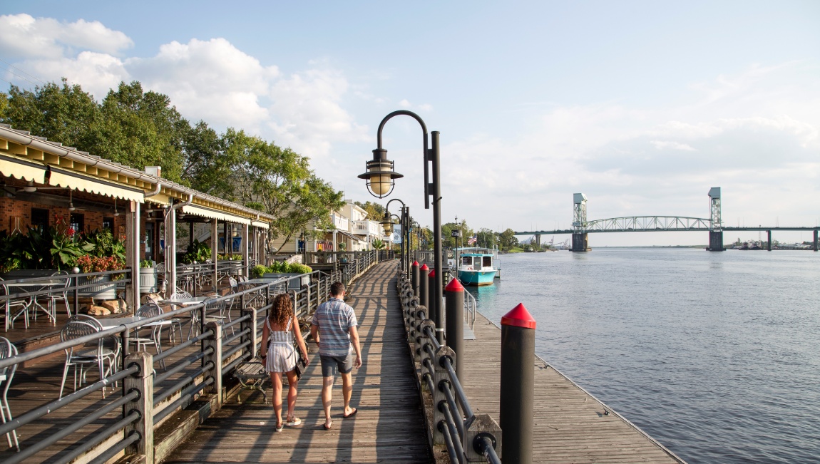 Wilmington is a port city in North Carolina. It’s known as a gateway to Cape Fear Coast beaches like Wrightsville, with its strong surf, and Carolina, with its long boardwalk. Part of downtown’s Historic District, the Riverwalk is lined with restaurants, galleries and shops. It runs along the Cape Fear River, where the Battleship North Carolina is moored.
