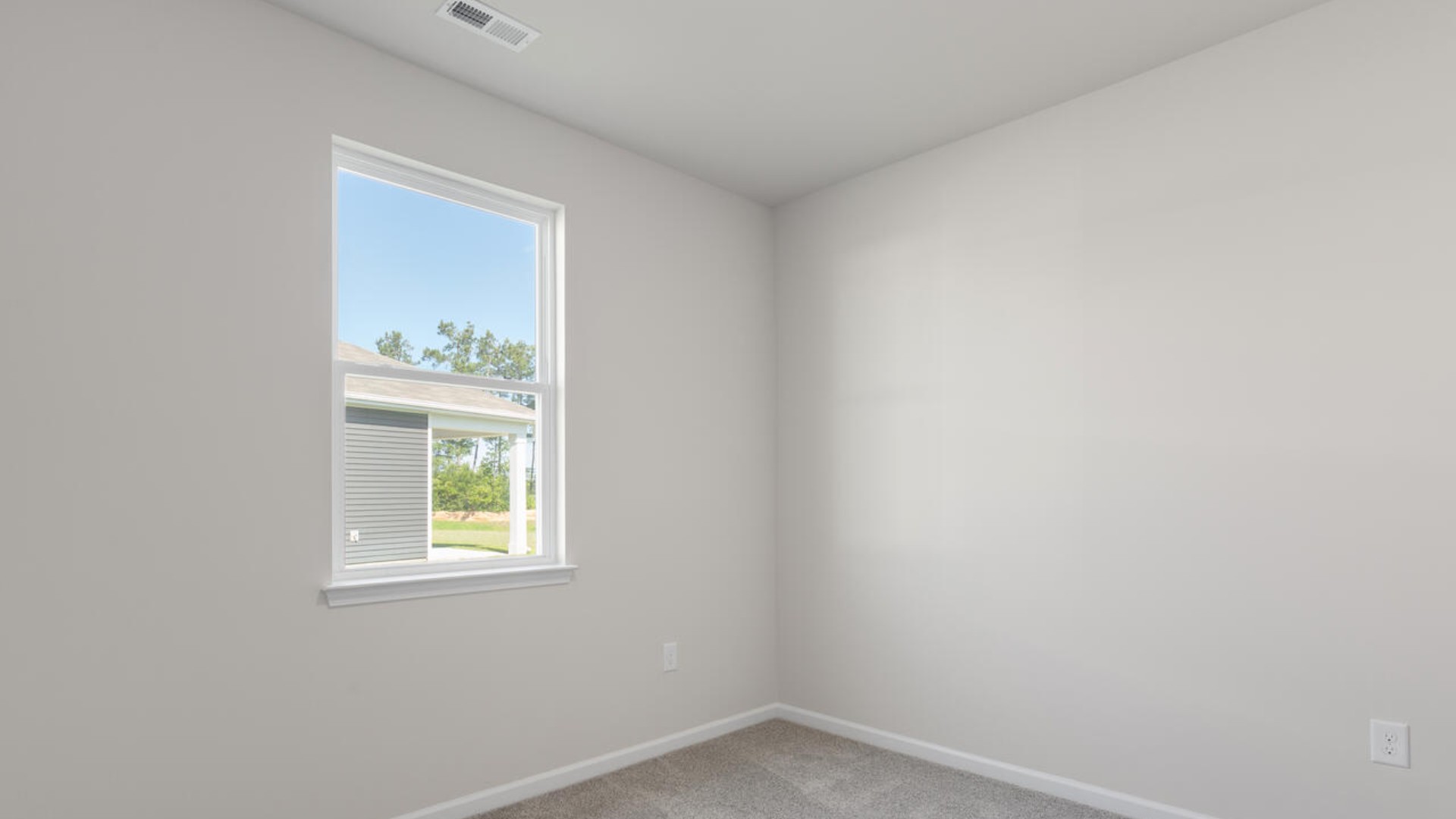 Three additional bedrooms and a second full bath ensure room for all, whether for visiting family or a home office.