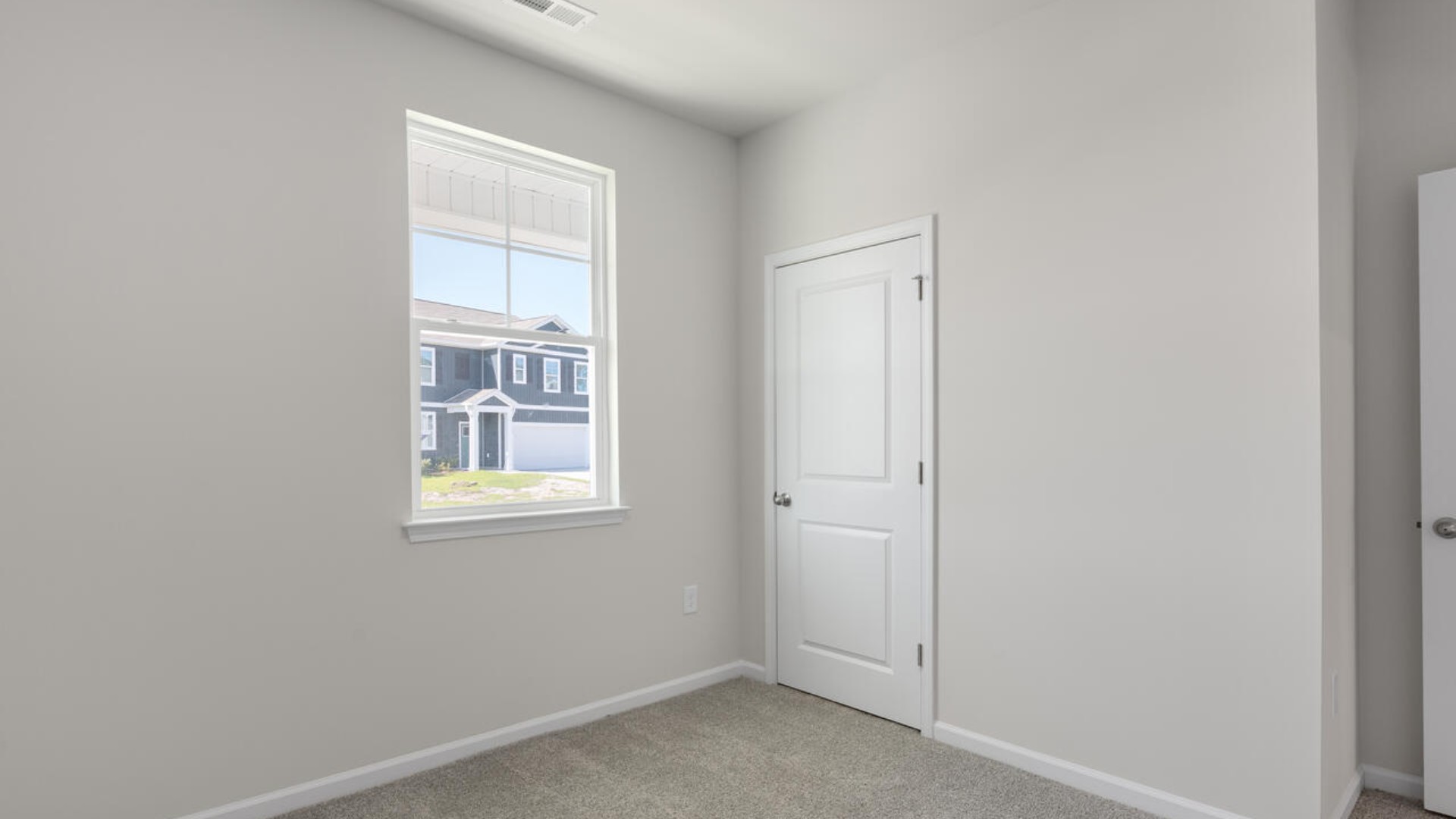 Three additional bedrooms and a second full bath ensure room for all, whether for visiting family or a home office.
