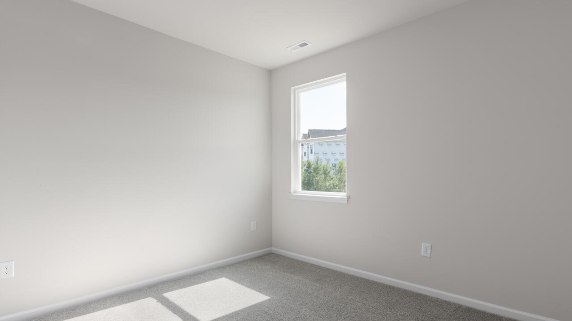 Three additional bedrooms and a second full bath ensure room for all, whether for visiting family or a home office.