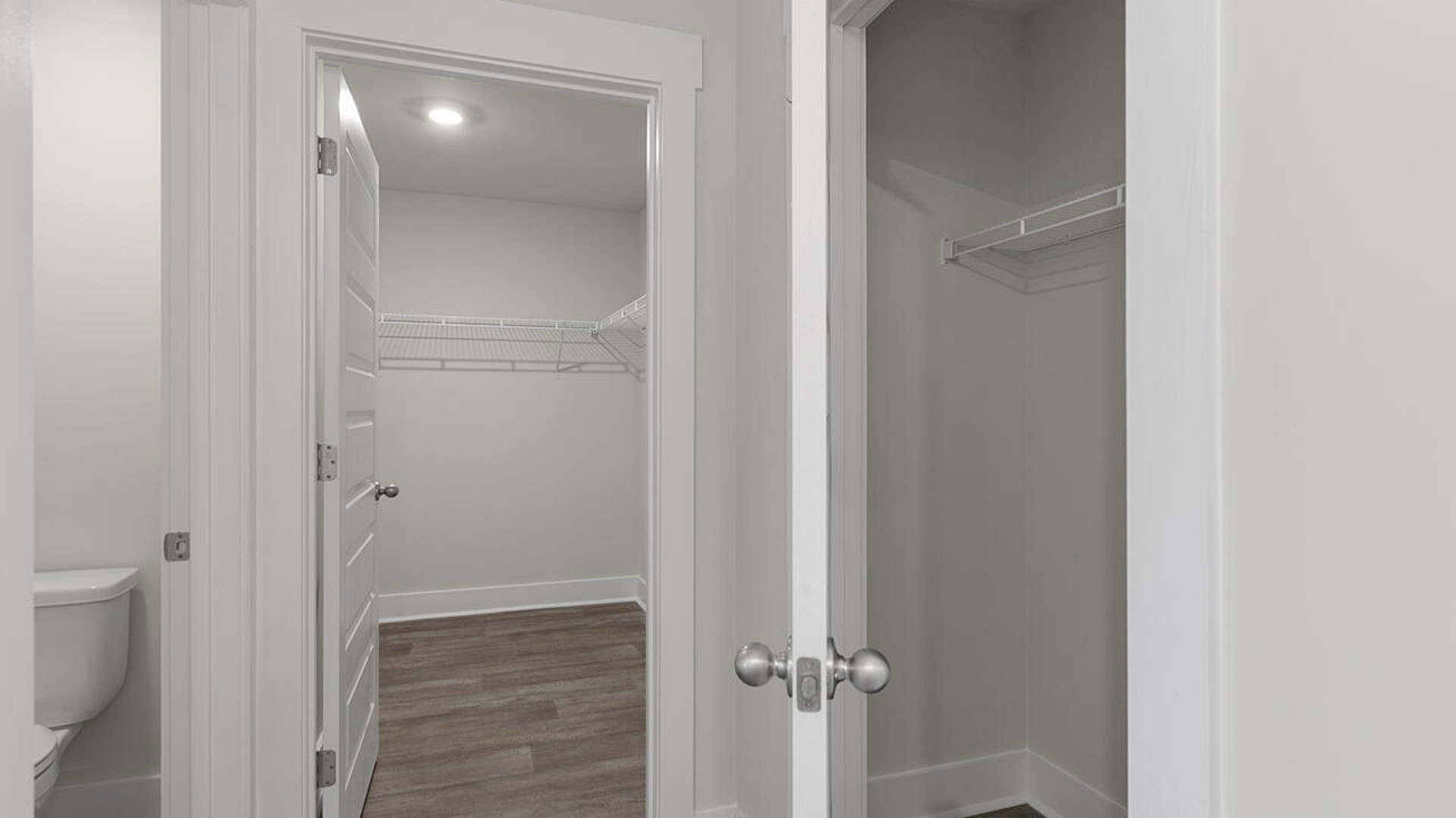 The primary bedroom has its own attached bathroom that features a walk-in closet and all the space you need to get ready in the morning
